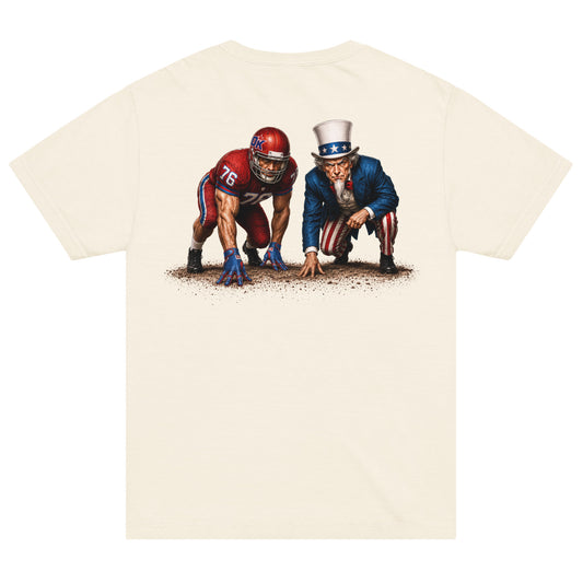 Front view of the FOX Outkick Uncle Sam Football Oversized T-Shirt in a clean, suburban American backyard setting.