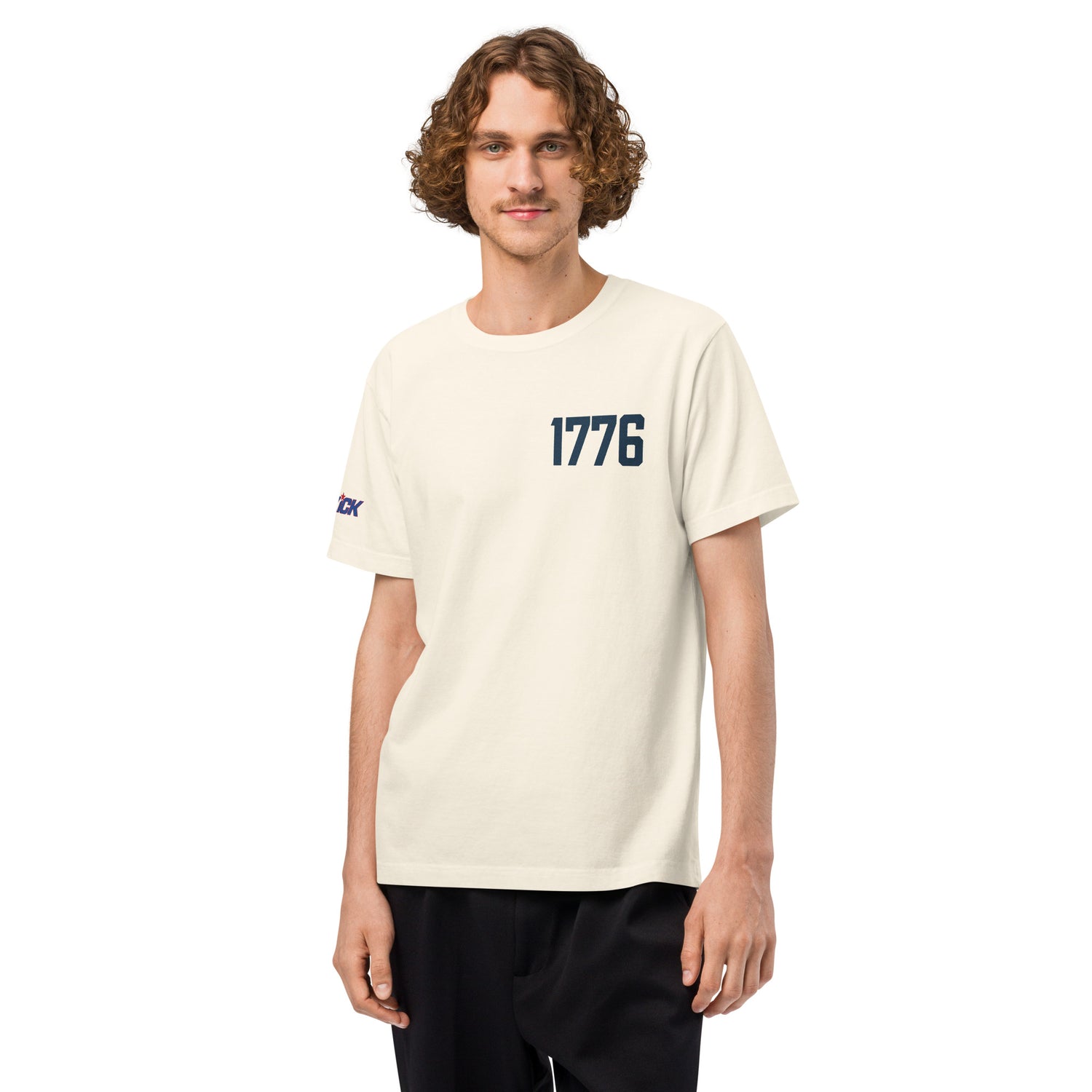 A comfortable backyard setting showcasing the relaxed fit and premium fabric of the oversized tee.