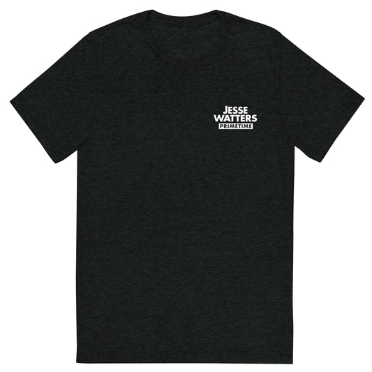 A loyal FOX News viewer wearing the charcoal-black triblend Jesse Watters Primetime t-shirt in a modern American living room.
